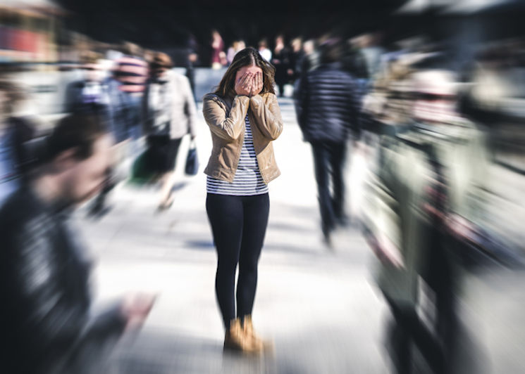 Woman overwhelmed from a dangerous situation